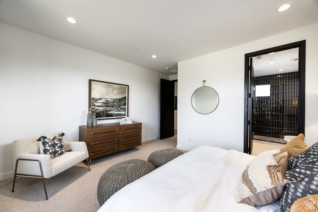 Bedroom with light carpet, baseboards, and recessed lighting