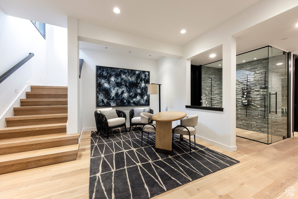 Common area with stairway and recessed lighting
