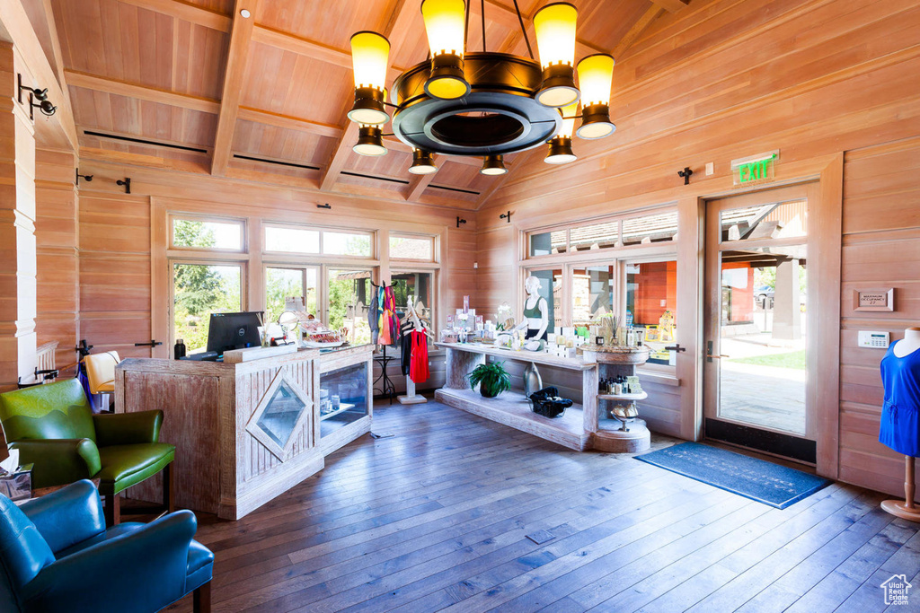 Reception area featuring wooden walls and wooden ceiling
