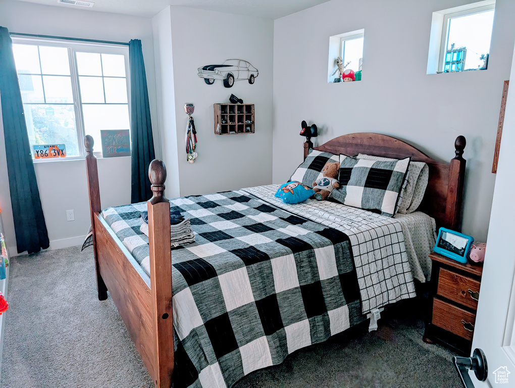 View of carpeted bedroom