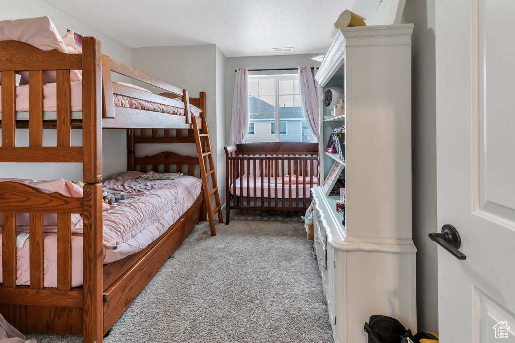 Bedroom featuring carpet
