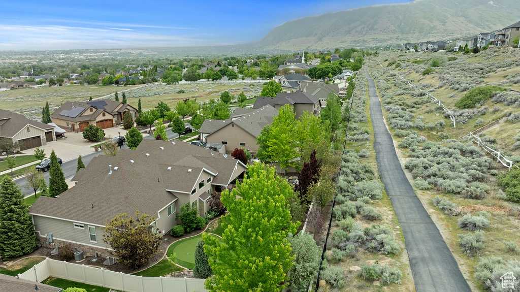 Aerial perspective of suburban area featuring mountains