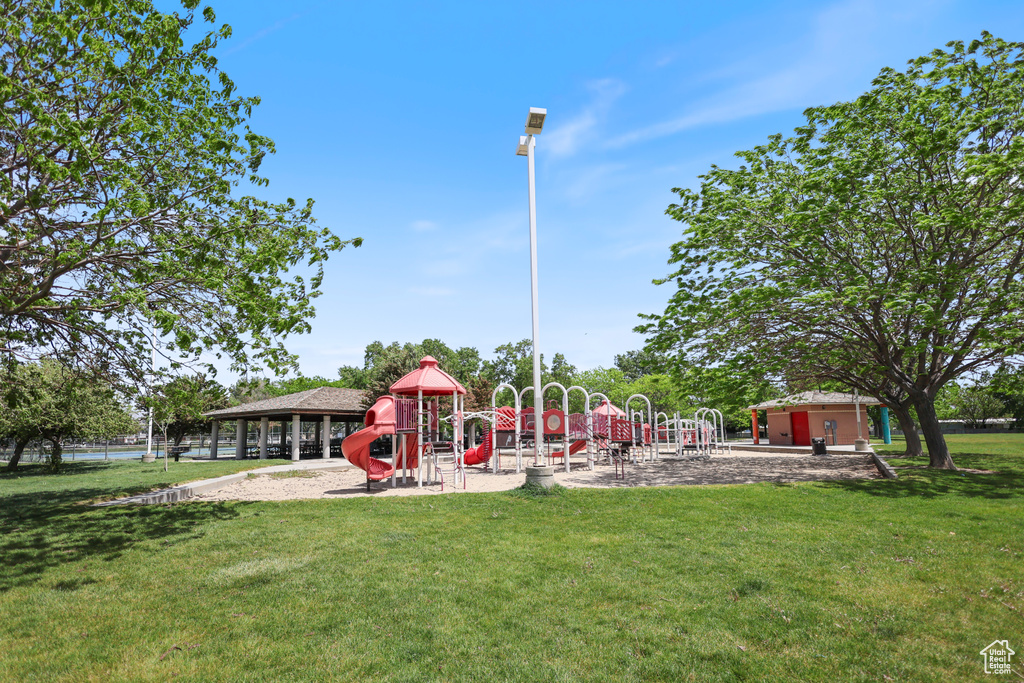Community playground with a yard and a gazebo