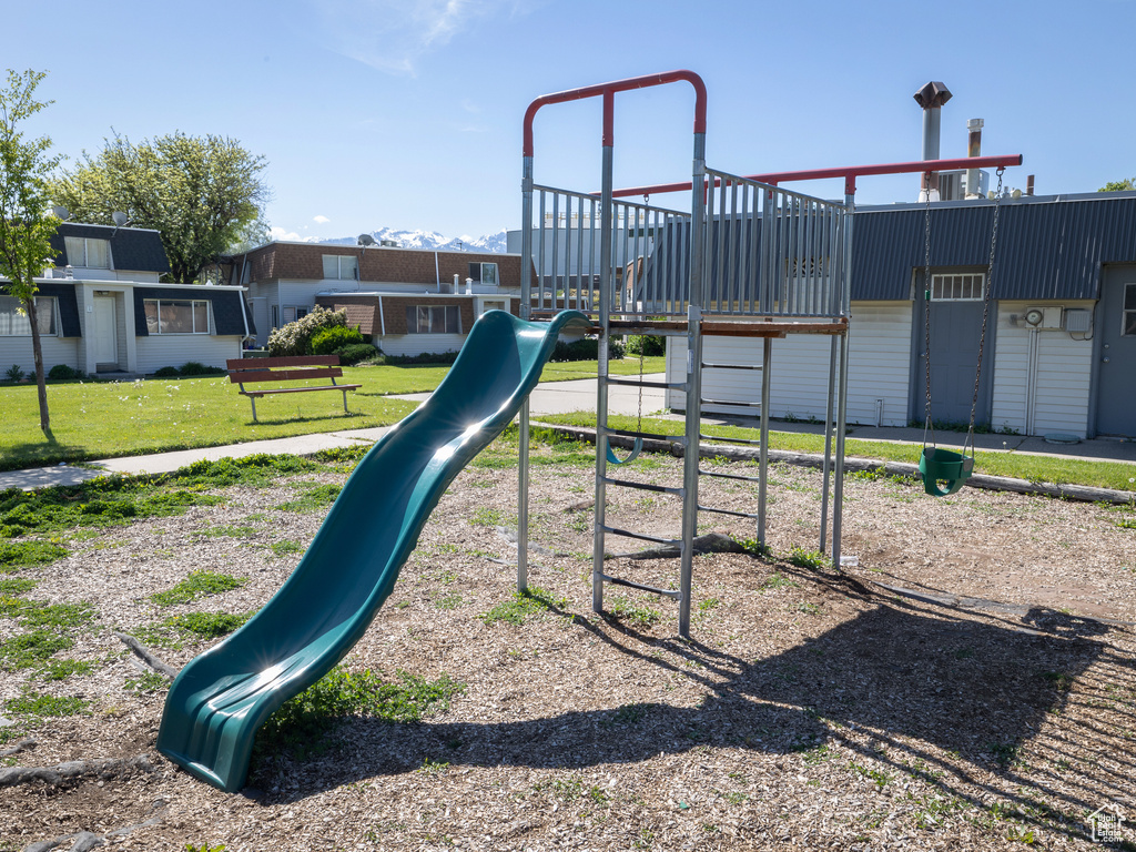 Community playground with a lawn
