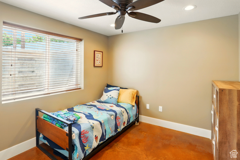 Bedroom featuring baseboards, recessed lighting, and ceiling fan
