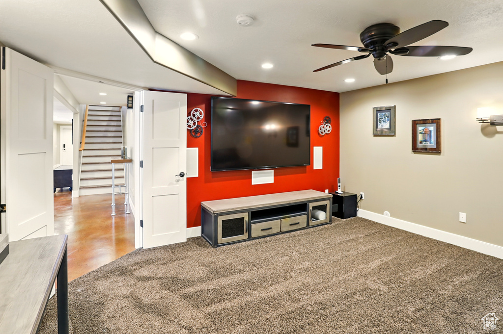 Home theater room featuring baseboards, ceiling fan, and recessed lighting