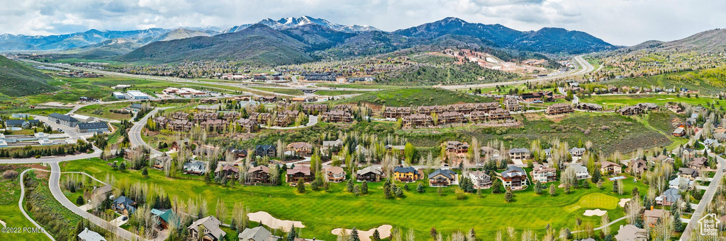 Aerial view of residential area with a mountain backdrop