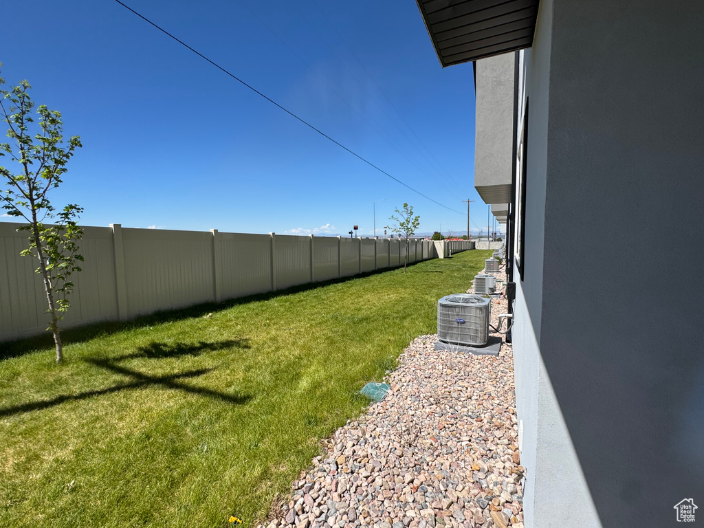 View of yard featuring central AC