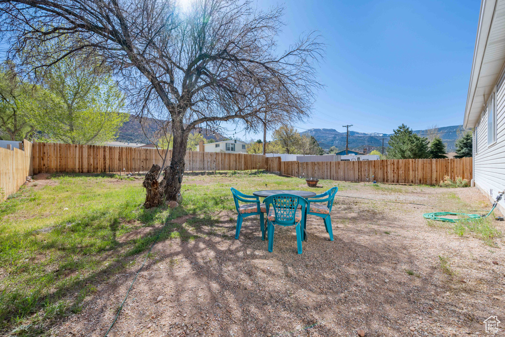View of yard with a mountain view