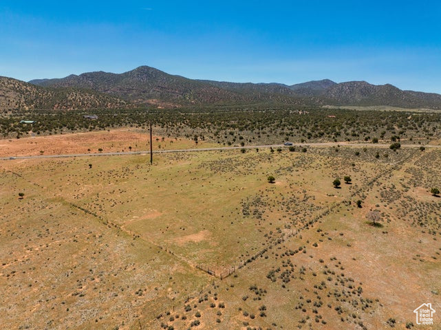 View of mountain backdrop featuring rural landscape and a desert landscape