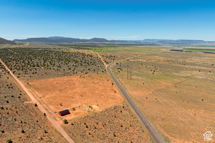 View of property location with a mountainous background and rural landscape