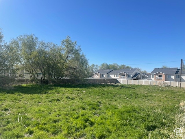 View of yard with fence