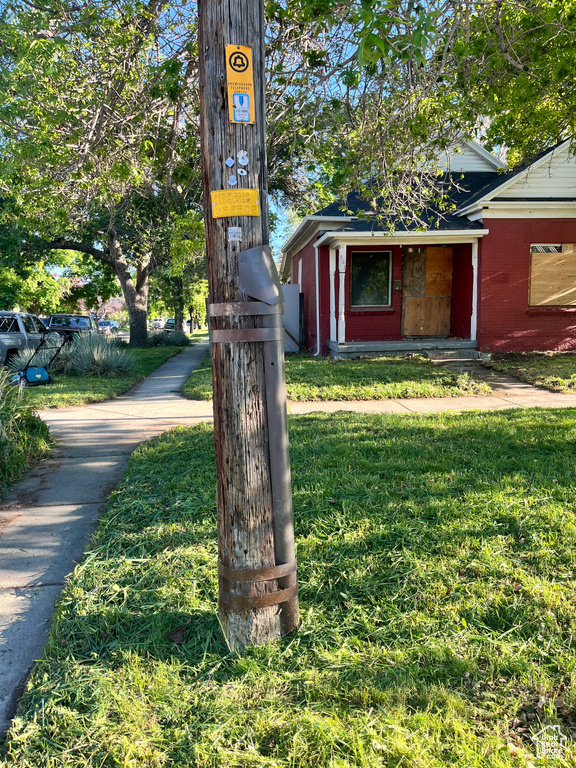 View of front of house with a front yard