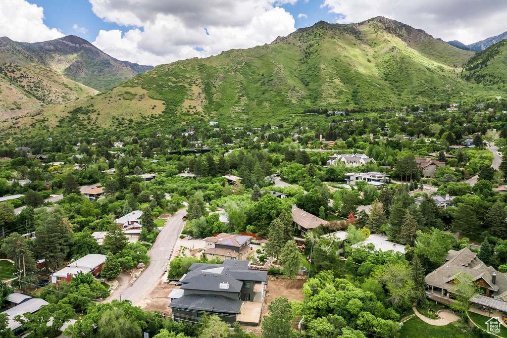 Aerial overview of property's location featuring a mountain backdrop