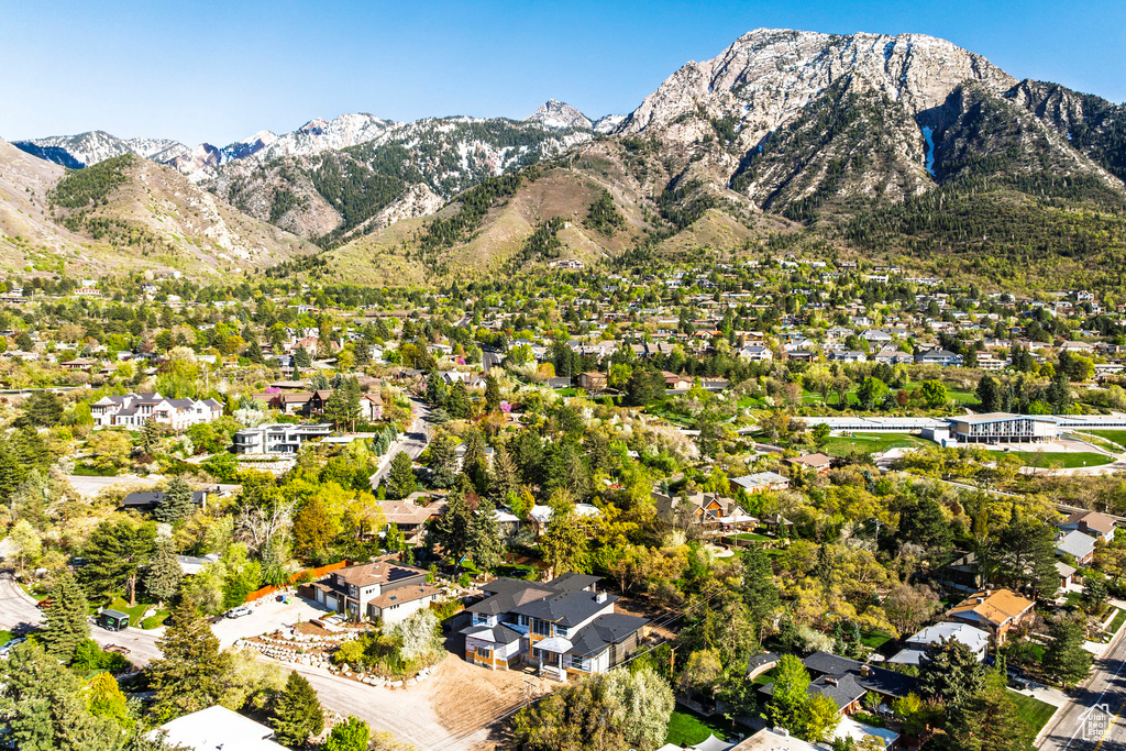 Exterior space featuring a residential view and a mountain view