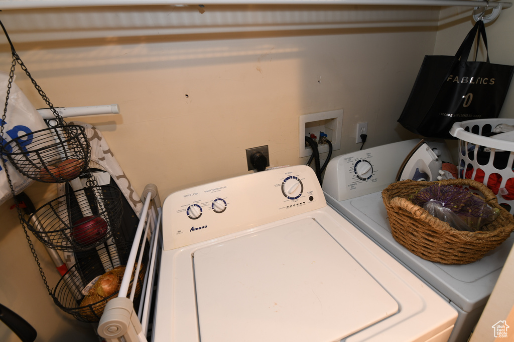 Laundry room featuring washing machine and dryer