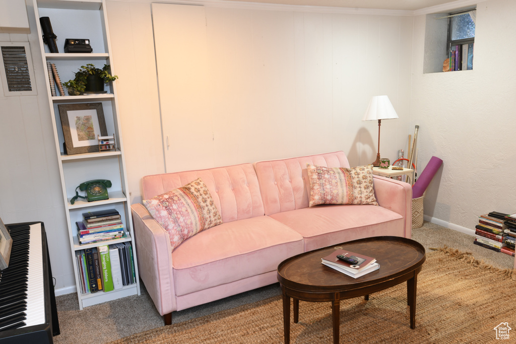 Living room with carpet flooring and baseboards