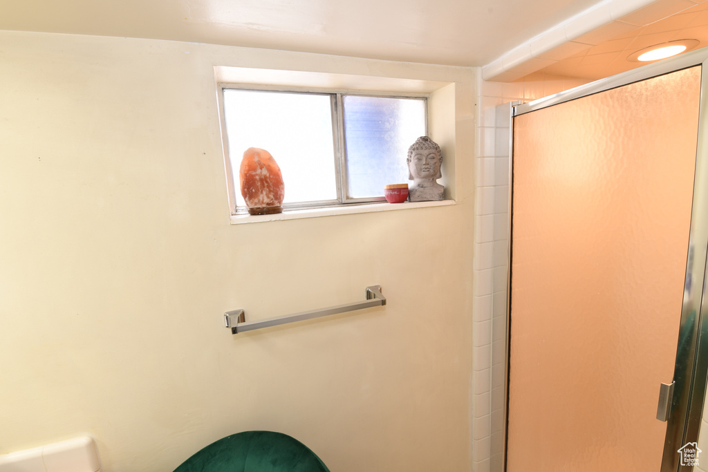 Bathroom featuring an enclosed shower
