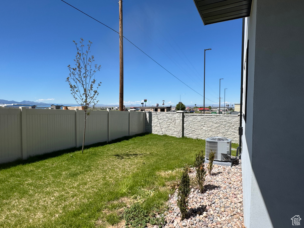 View of yard with cooling unit