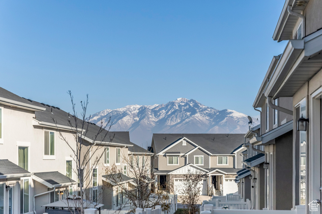View of mountain background featuring nearby suburban area