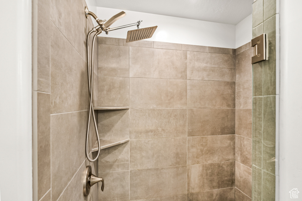 Bathroom view of tiled shower