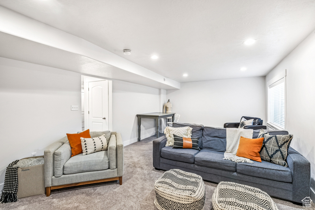 Carpeted living room featuring recessed lighting