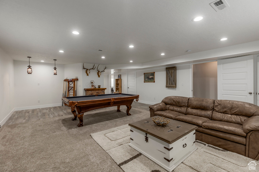 Recreation room featuring recessed lighting, light colored carpet, baseboards, and pool table