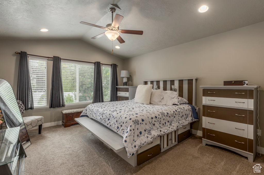 Bedroom with lofted ceiling, carpet, baseboards, recessed lighting, and a ceiling fan