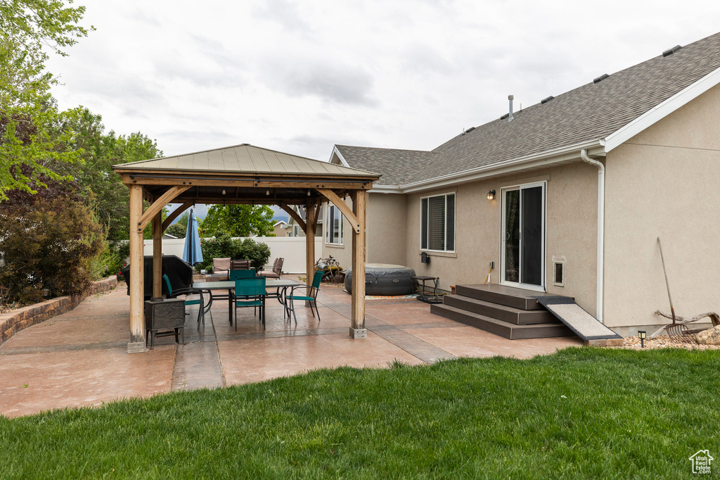 View of patio featuring a gazebo