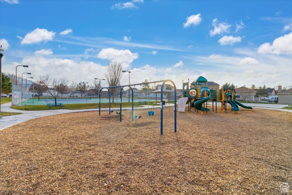 Community play area featuring fence
