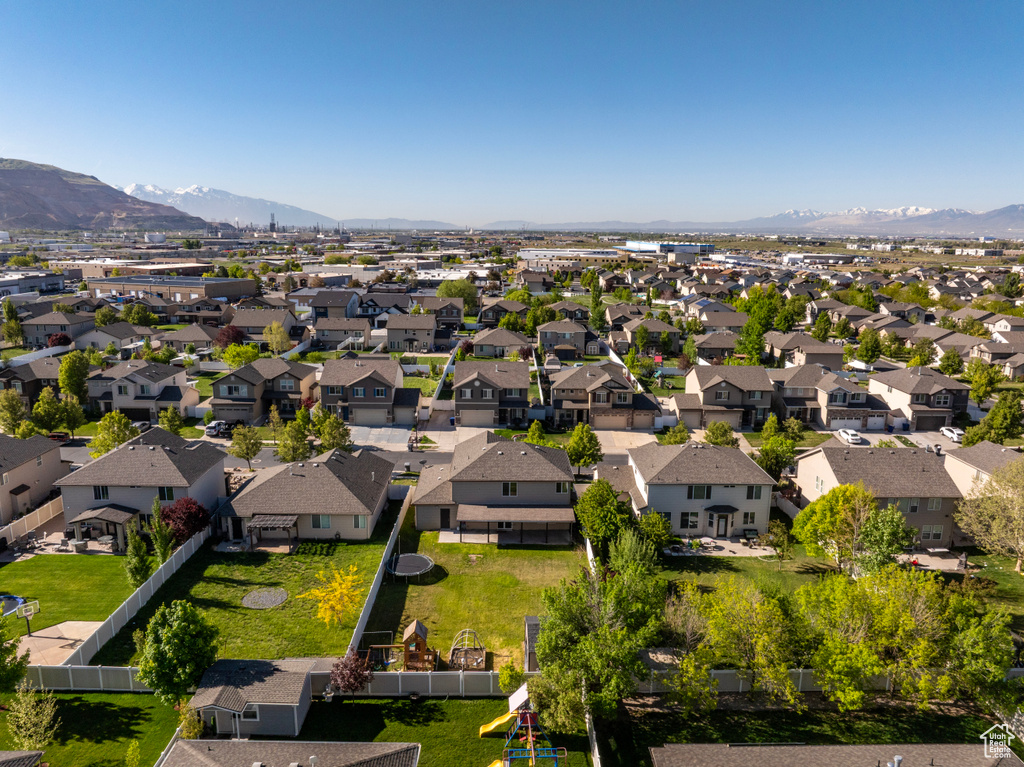 Aerial view of residential area with mountains