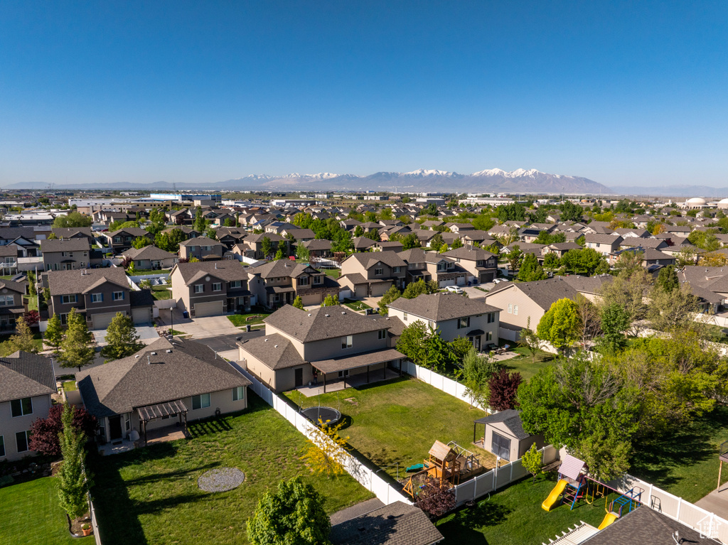 Aerial perspective of suburban area with mountains