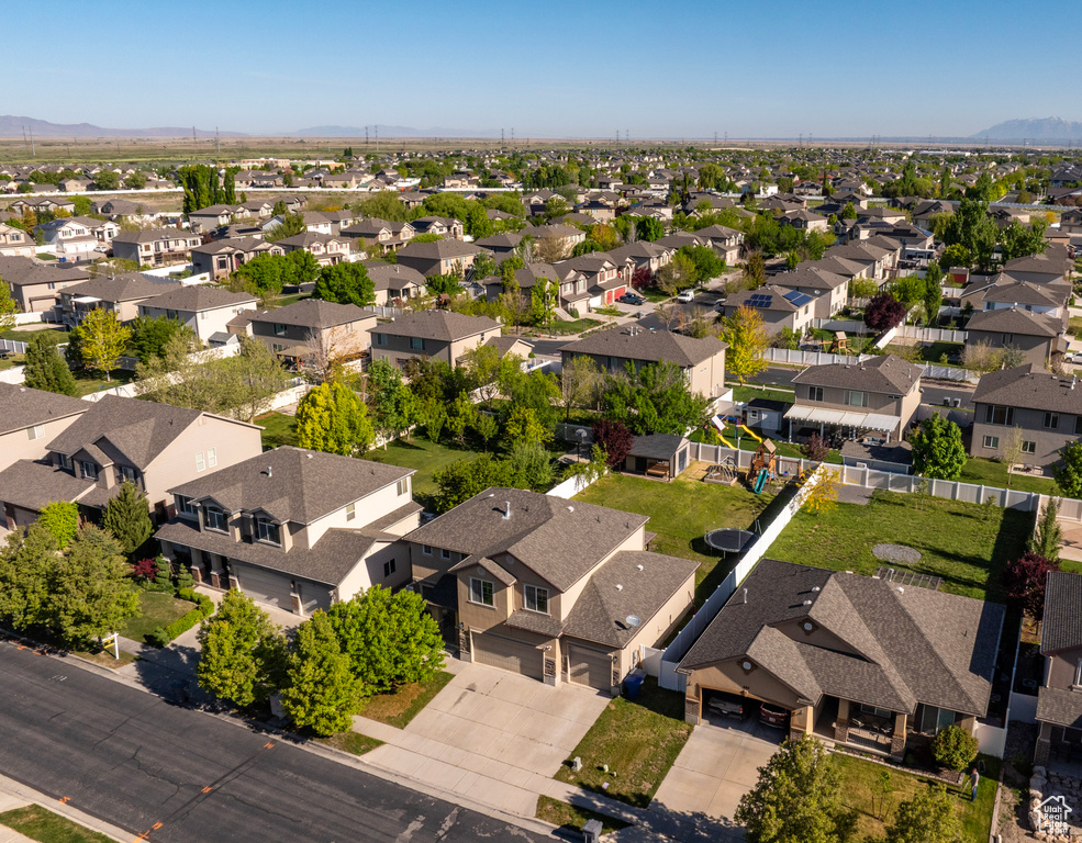 Aerial perspective of suburban area featuring mountains