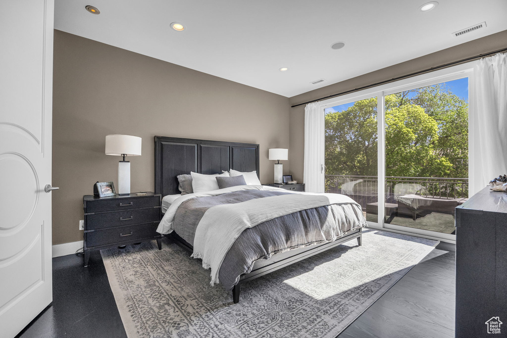 Bedroom with access to outside and recessed lighting