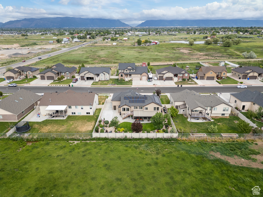 Aerial view of residential area with a mountainous background