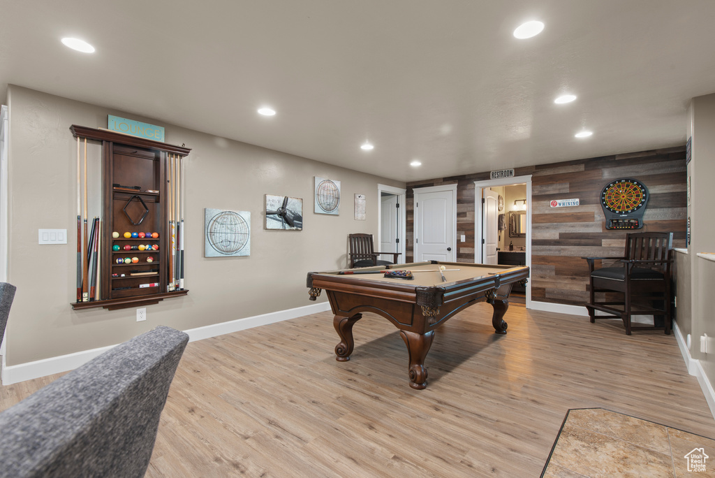 Game room with billiards, recessed lighting, light wood-type flooring, baseboards, and wood walls