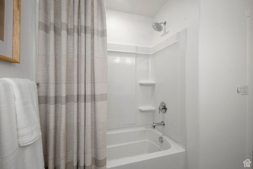 Bathroom featuring shower / tub combo