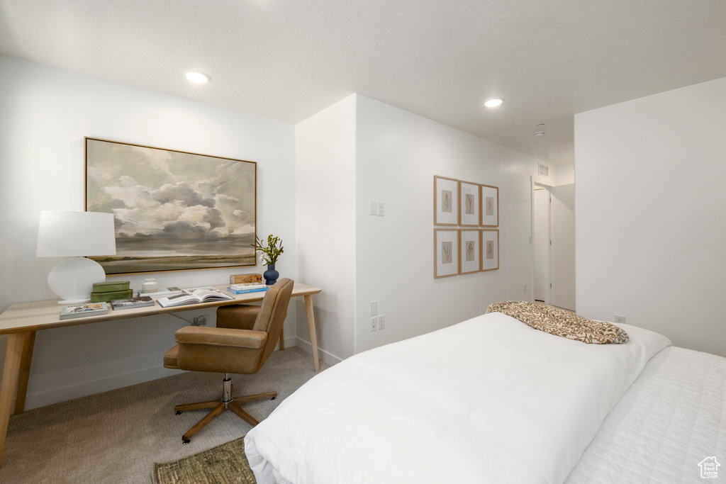 Bedroom featuring carpet floors, an office area, and recessed lighting