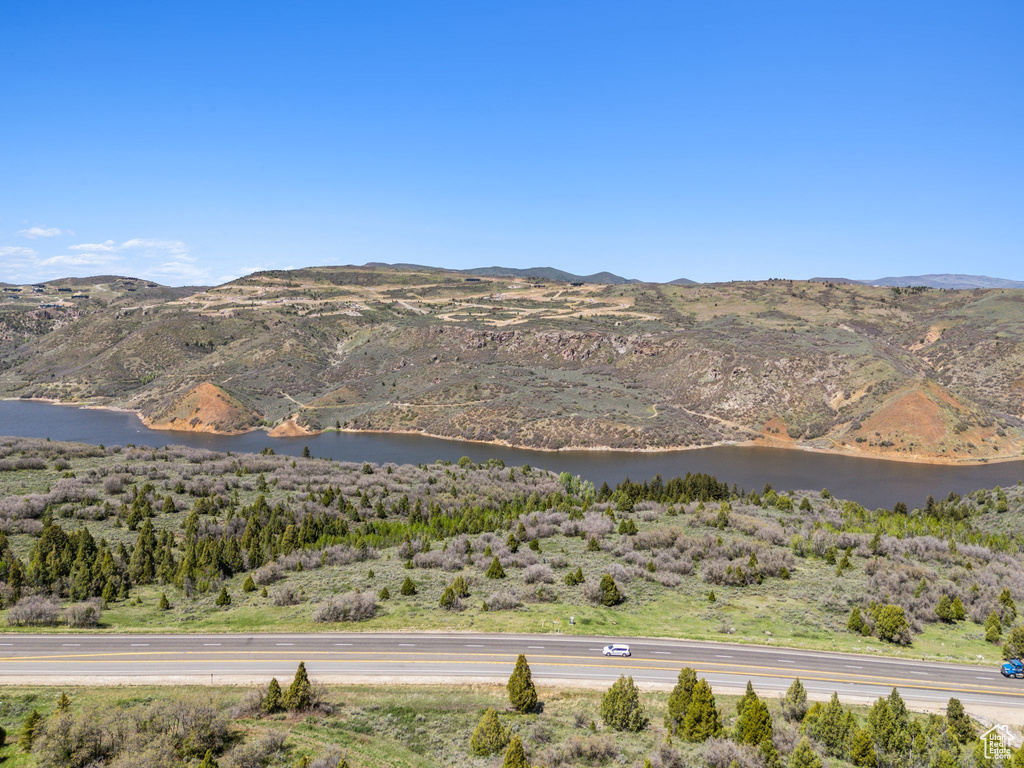 View of mountain background featuring a large body of water