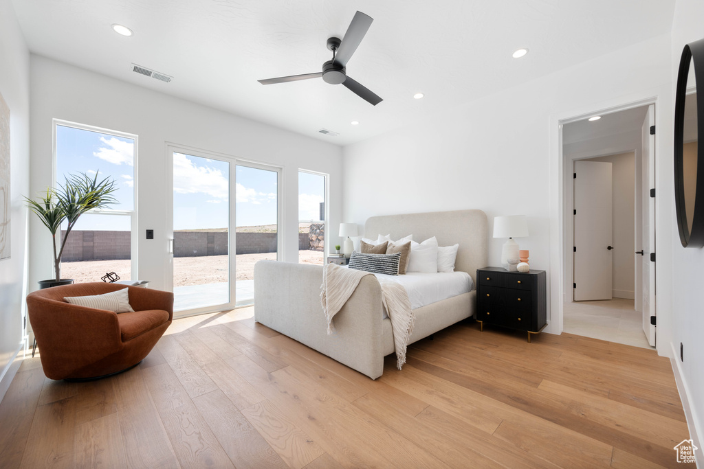 Bedroom with access to exterior, light wood-style flooring, recessed lighting, and ceiling fan