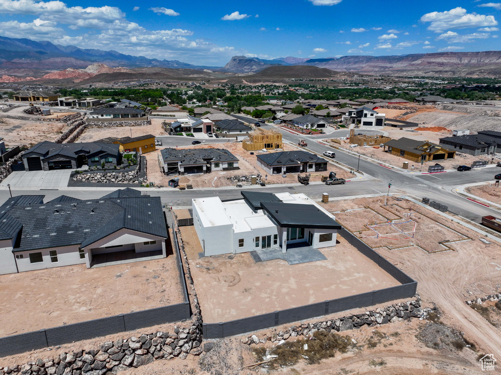 Aerial perspective of suburban area featuring mountains