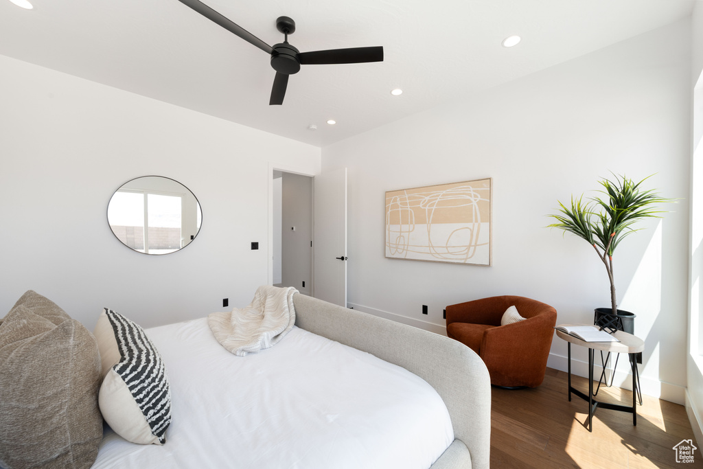 Bedroom featuring wood finished floors, recessed lighting, a ceiling fan, and baseboards