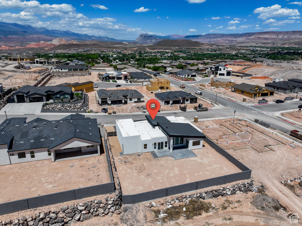 Aerial view of residential area with mountains