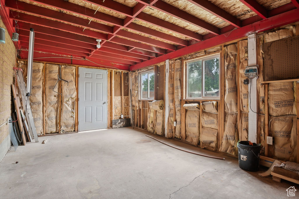 Misc room with unfinished concrete floors