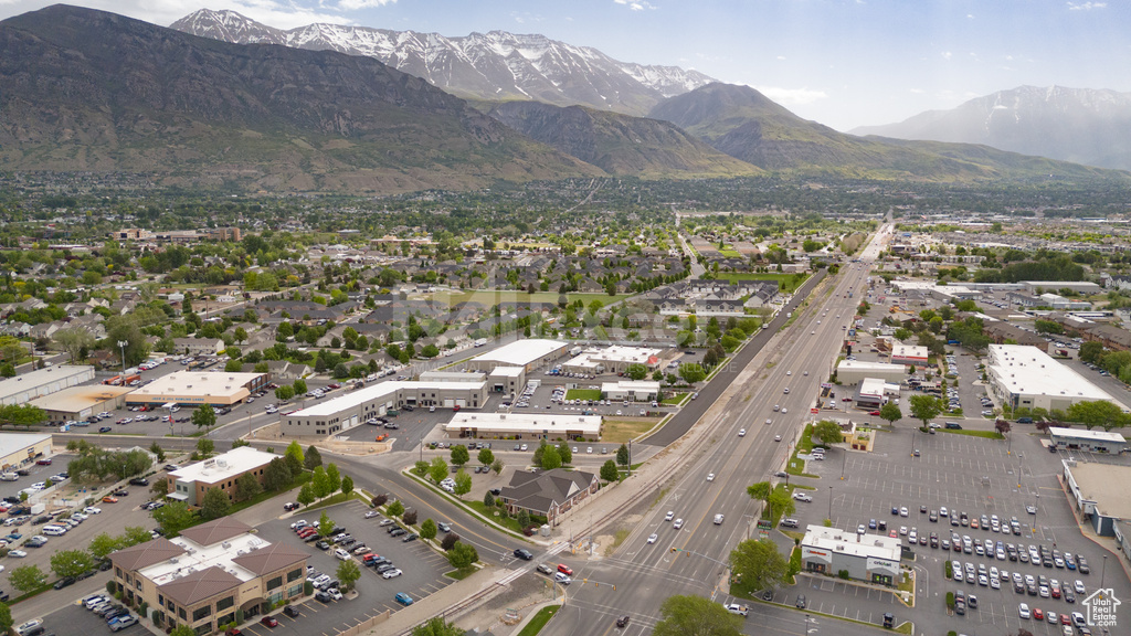 View of property location featuring a main thoroughfare and a mountainous background