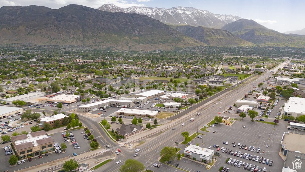 Aerial overview of property\'s location featuring a mountain backdrop