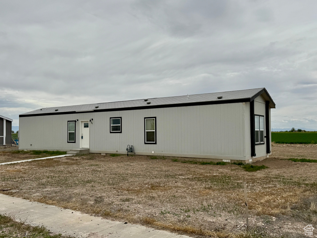 View of front facade with crawl space