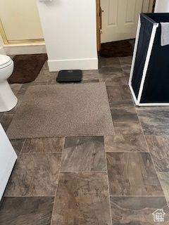 Bathroom view of toilet and range