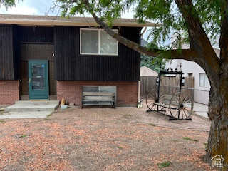 View of front of property with brick siding