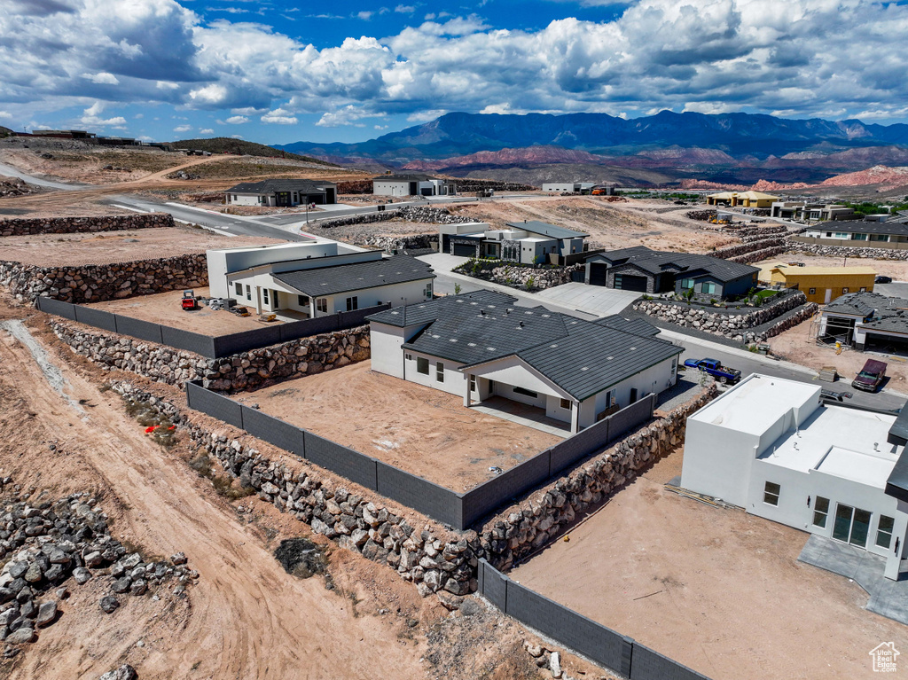 View of subject property with a mountainous background